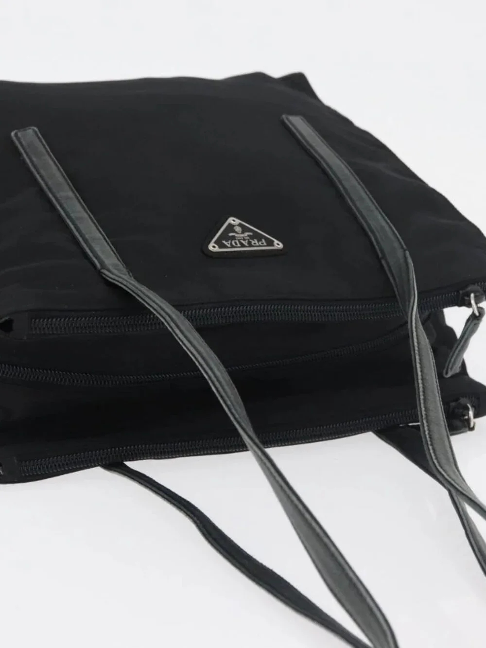 Prada brand	prada color	black